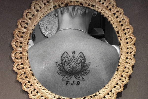 ♀ Lotus flower tattoo