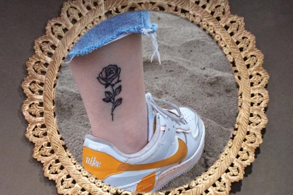 ♀ Rose on ankle tattoo