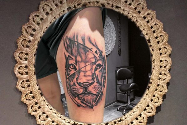 ♂ Lion on thigh tattoo